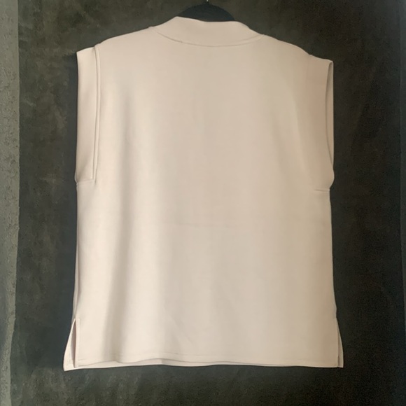 B. Young beige, lightweight vest. Only worn once! - Picture 5 of 7